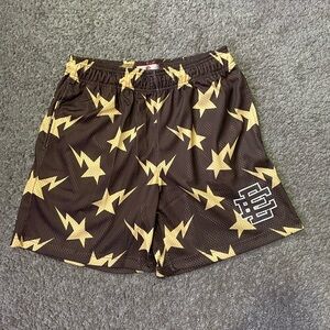 Eric Emanuel Brown and Yellow Athletic Shorts with Lightning Bolt Design